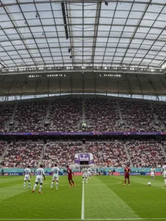 Dynamic European football match with players executing a fast counter-attack