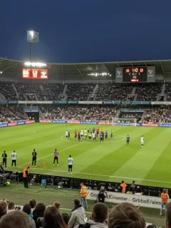 Dramatic football comeback celebration in a European stadium